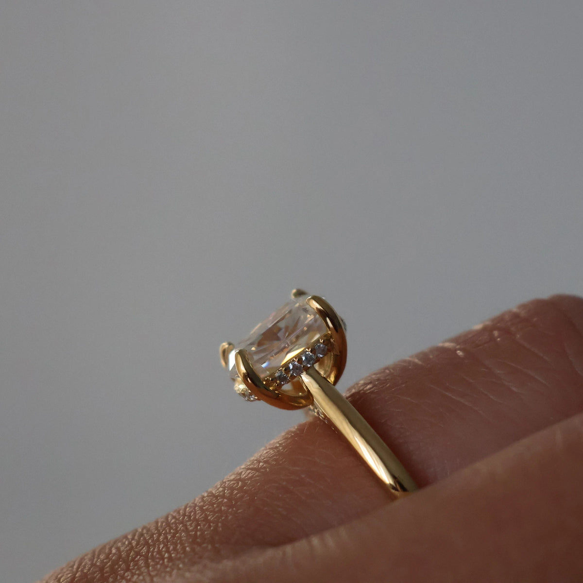 Side view of 3 Ct elongated cushion moissanite ring in 14k gold filled
