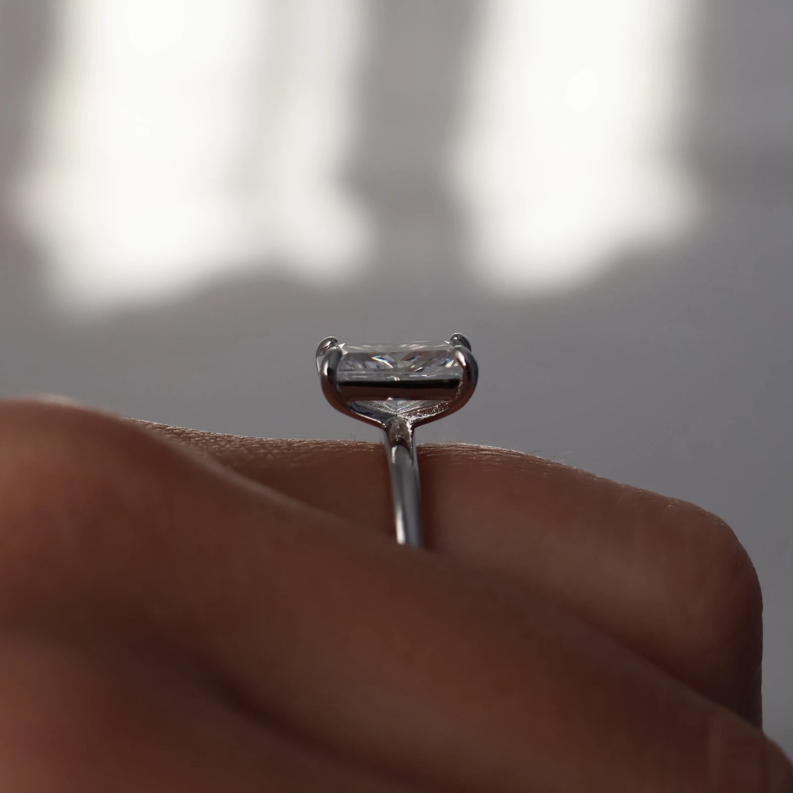 side profile of 3 carat elongated radiant cut CZ silver solitaire ring