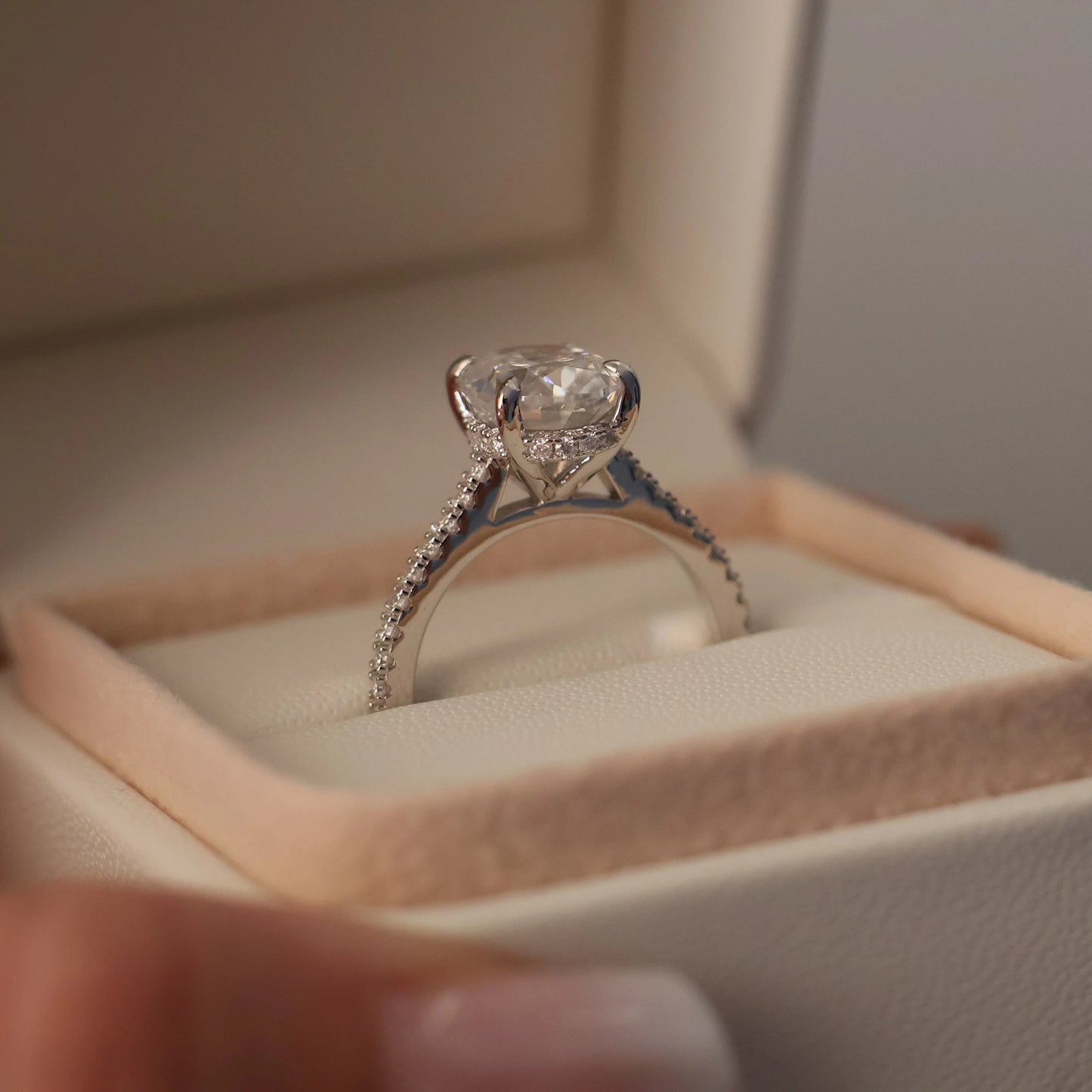 Oval moissanite engagement ring in silver with 3 carat centre stone and pave band