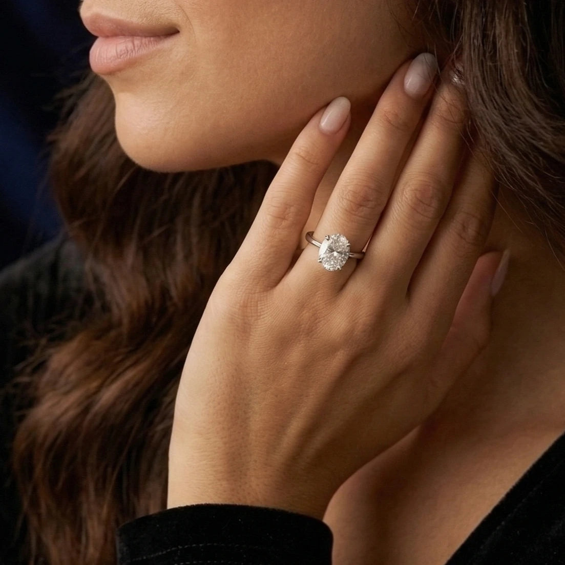 3 carat oval cut moissanite solitaire engagement ring set in a silver band