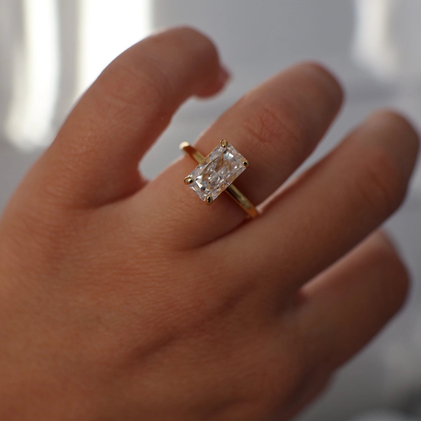 3 carat radiant cut ring in gold
