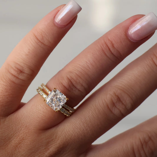 3ct radiant square ring with pavé band stacked with eternity band