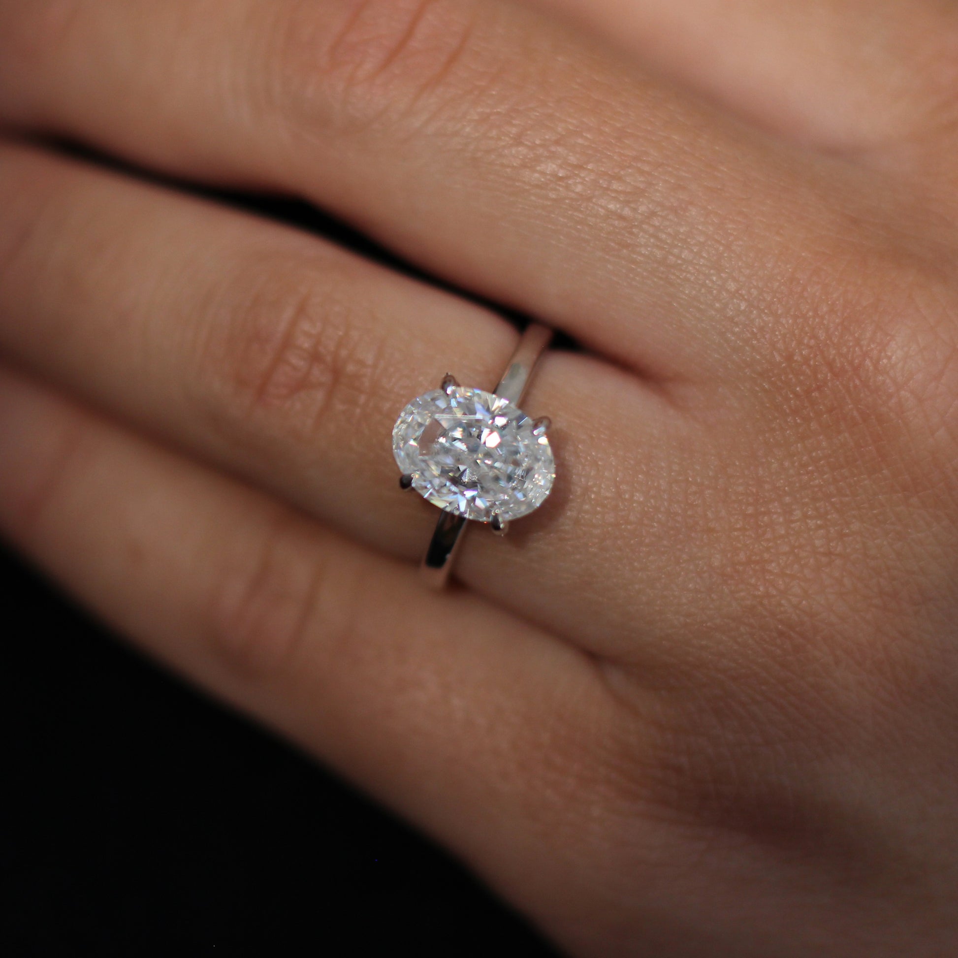 4 carat oval crushed ice moissanite engagement ring in silver