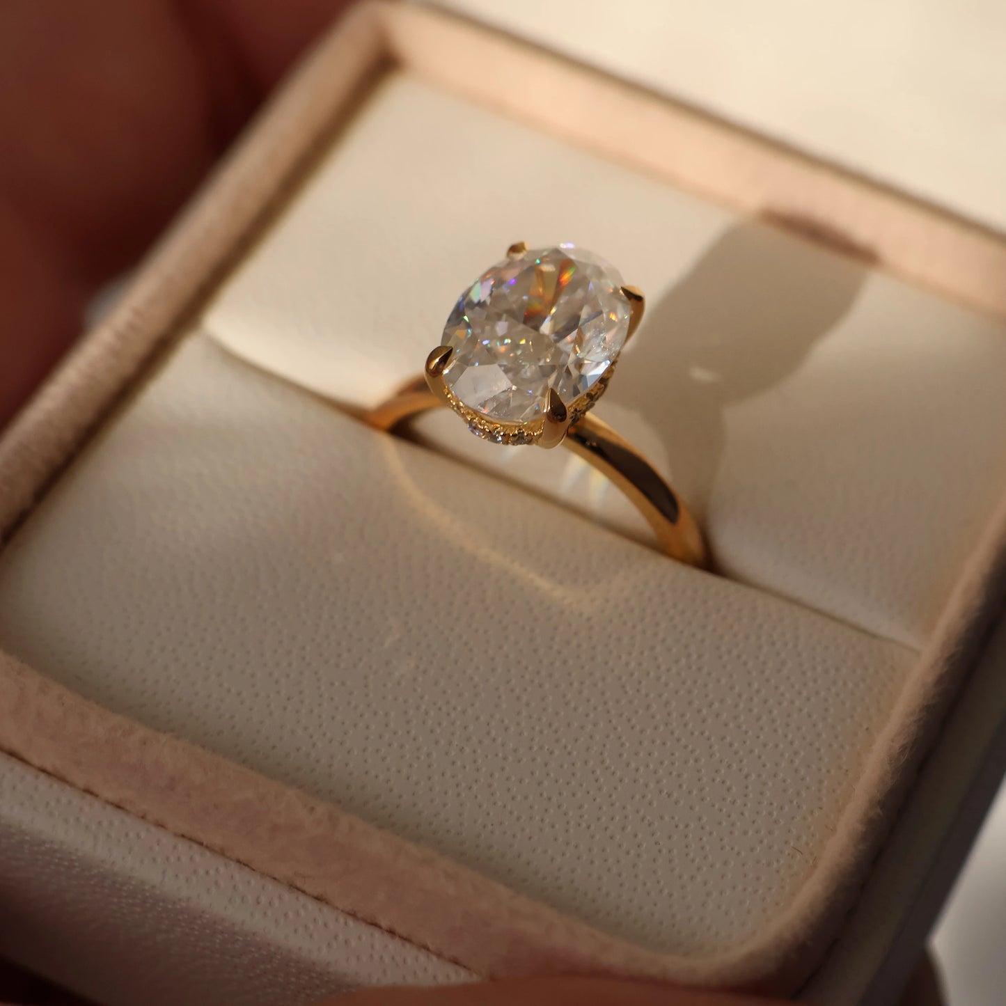 4 carat oval hidden halo moissanite engagement ring in a proposal box