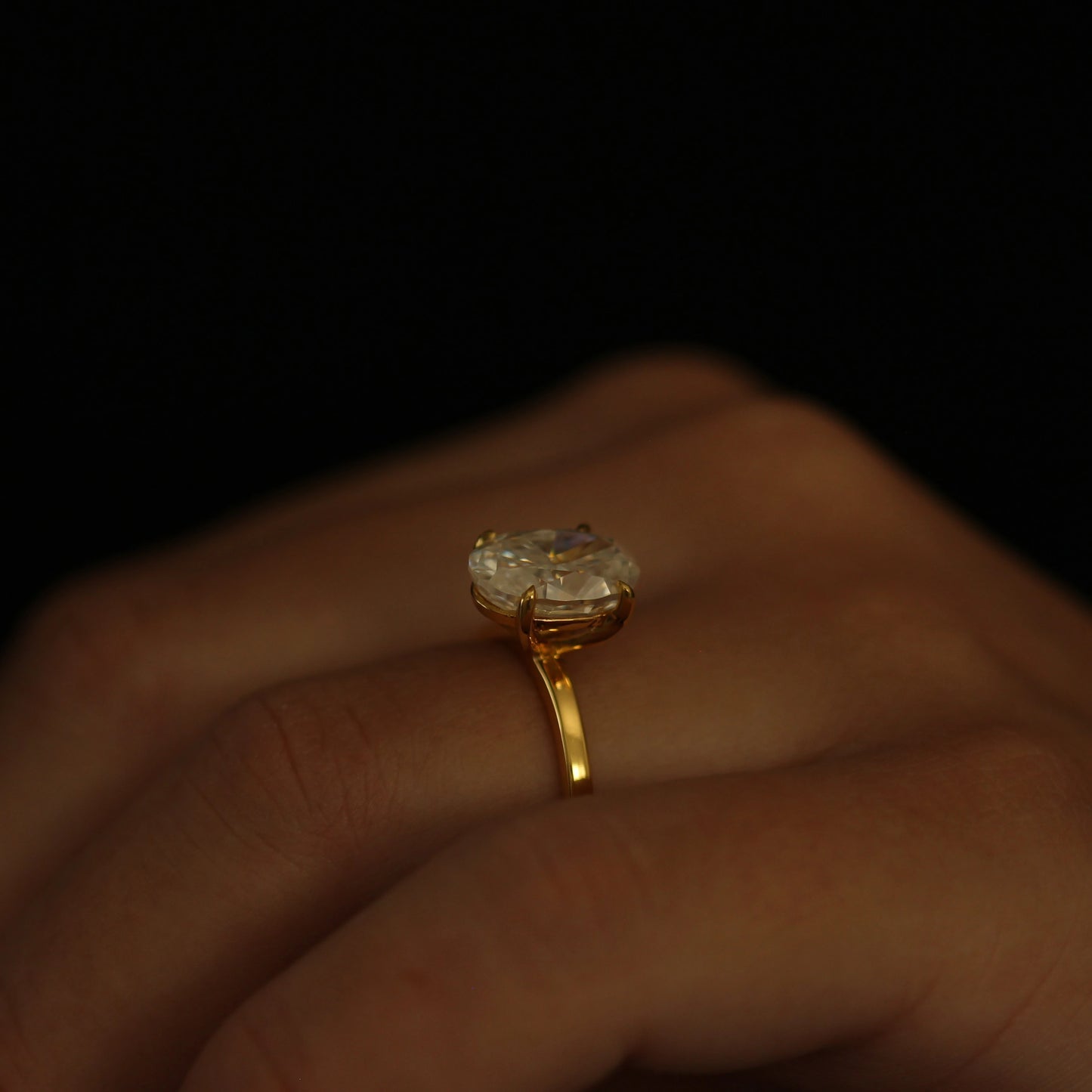 Side view of 18k gold filled 4 carat oval moissanite ring