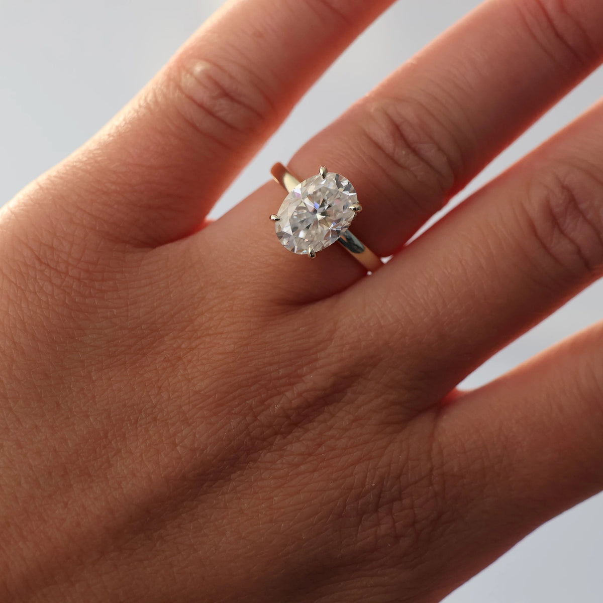 4 carat oval moissanite ring in light 14k gold filled