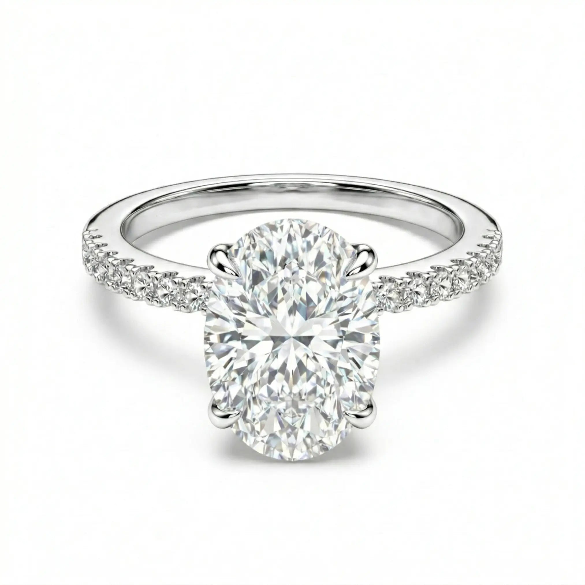 Oval moissanite ring with pave band on white background