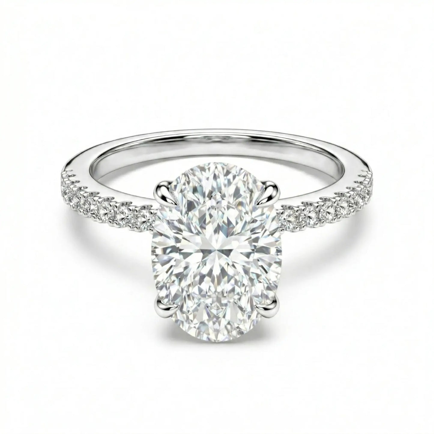 Oval moissanite ring with pave band on white background