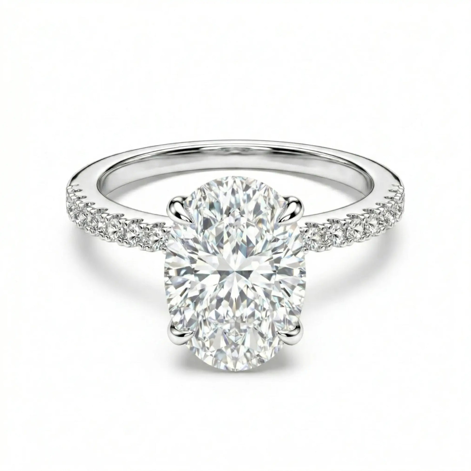 Oval moissanite ring with pave band on white background