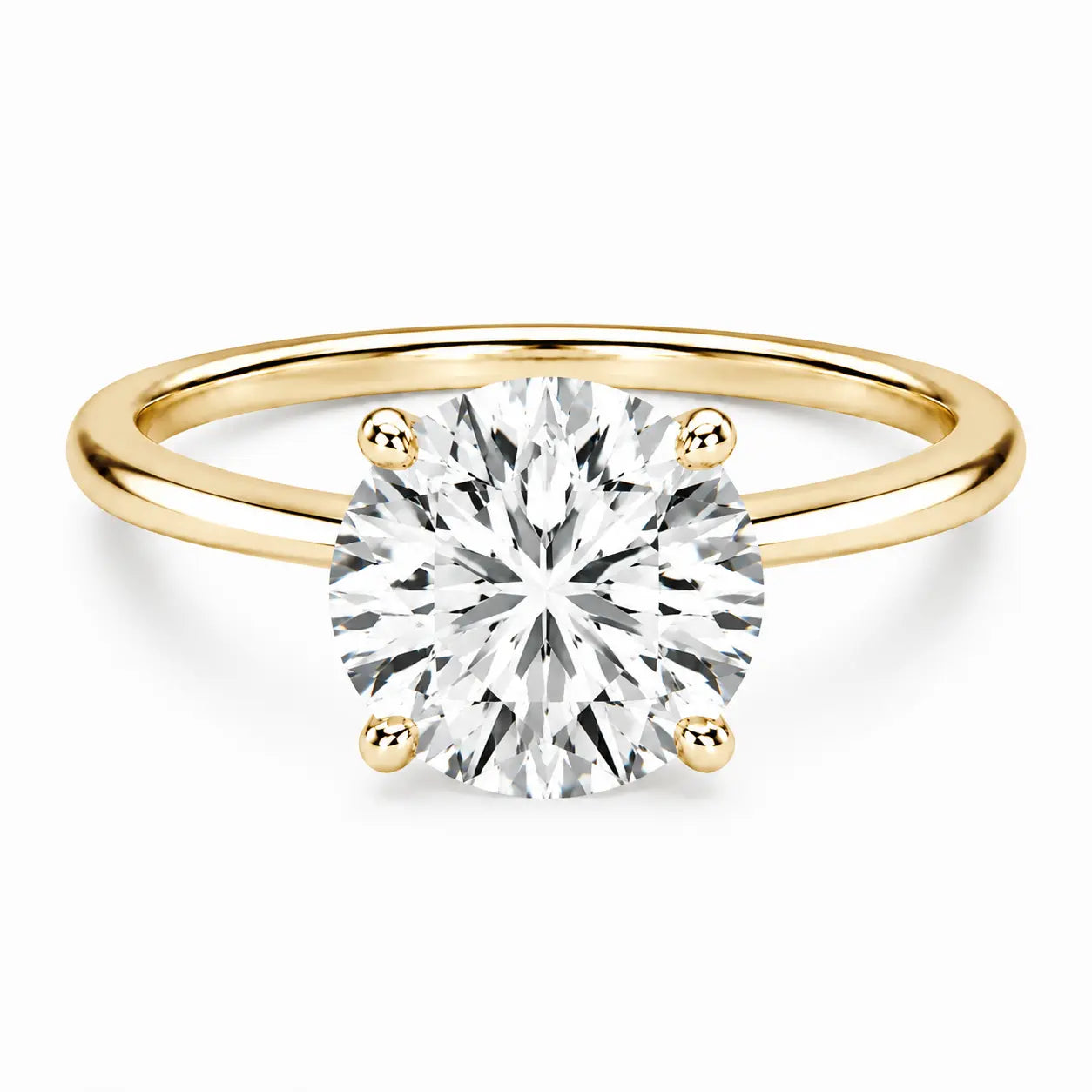 4 carat round cut gold ring on white background