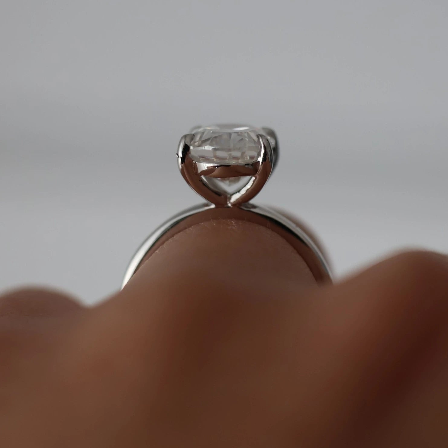4 carat oval crushed ice moissanite engagement ring in silver