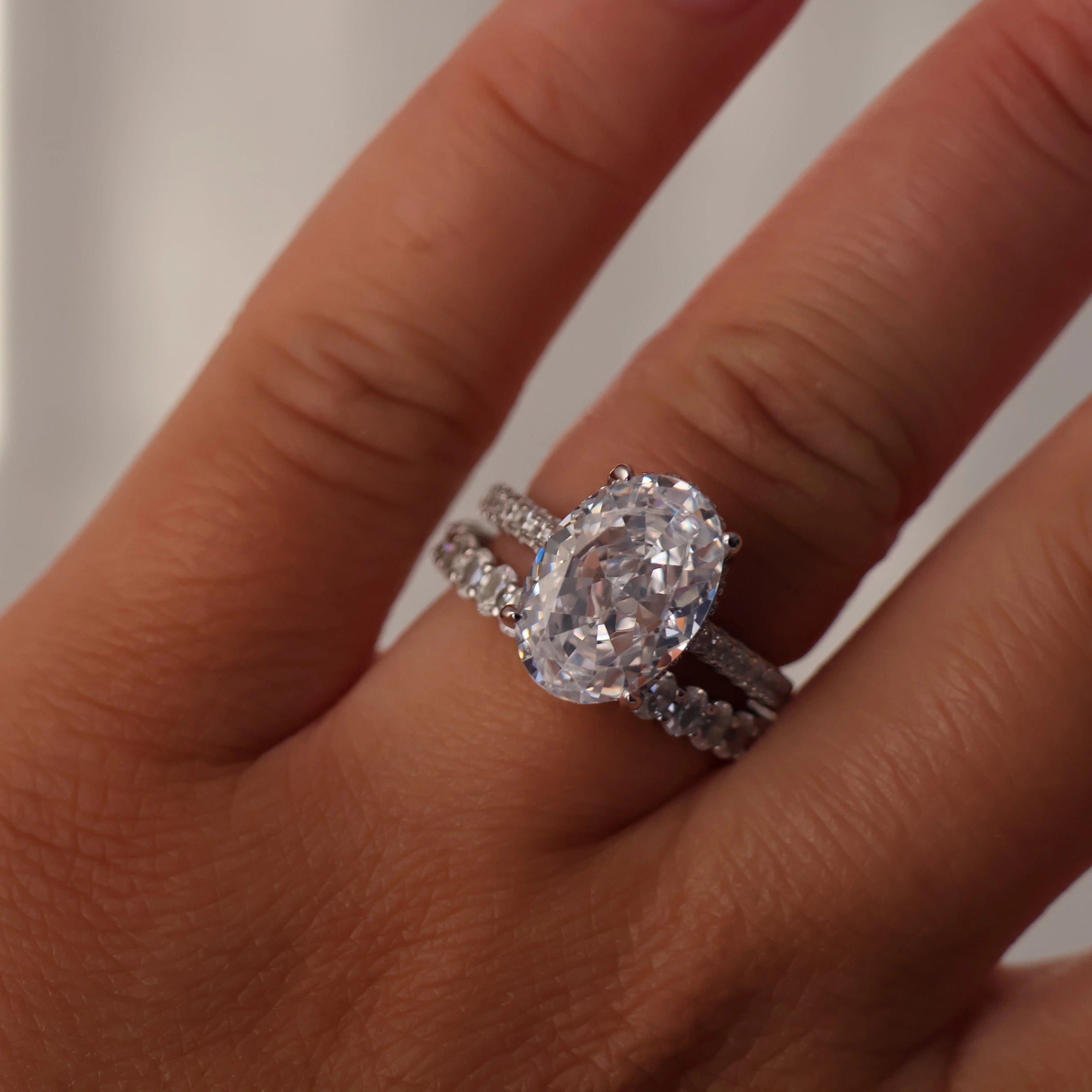4 carat oval cut cubic zirconia ring with hidden halo in silver