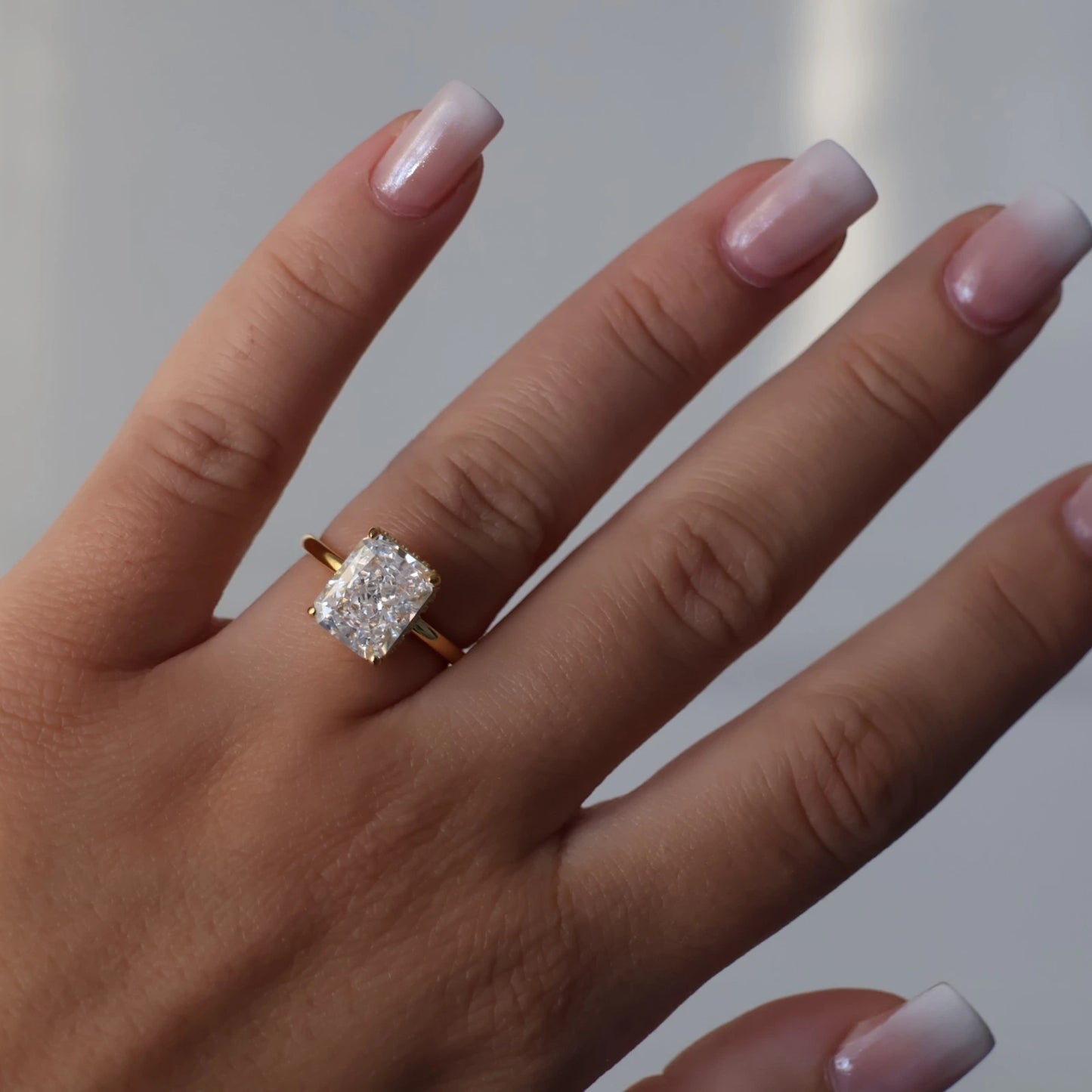 4ct radiant cut gold ring with hidden halo