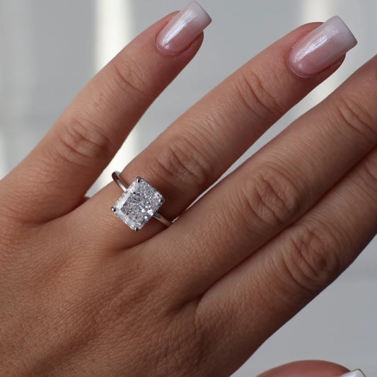 4 carat radiant cut silver ring with hidden halo