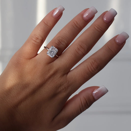 4ct radiant cut ring in silver with hidden halo