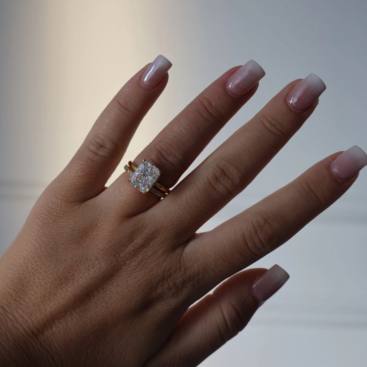 4ct radiant cut ring with hidden halo in gold