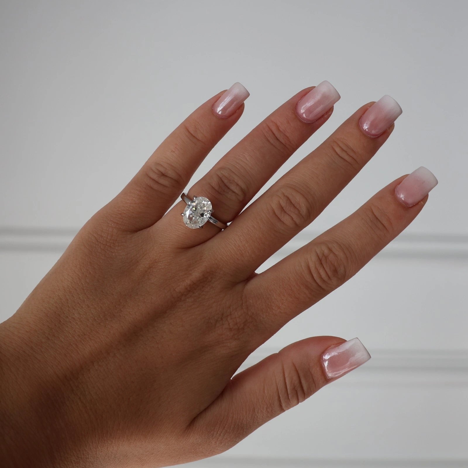 4ct silver oval moissanite engagement ring with crushed ice centre stone