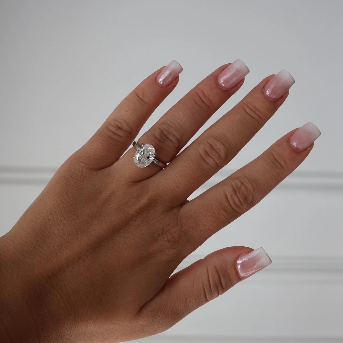 4ct silver oval moissanite engagement ring with crushed ice centre stone