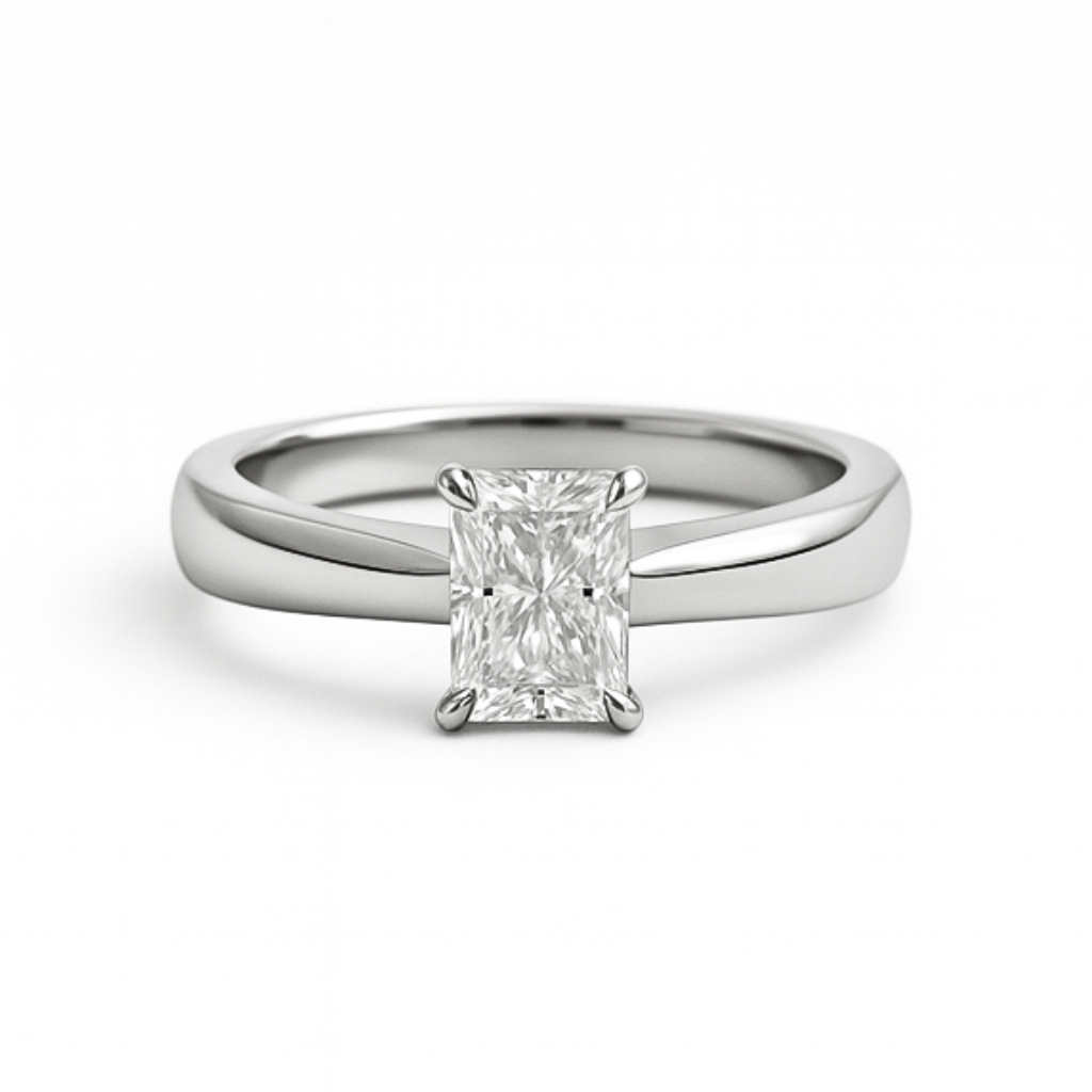 Radiant cut moissanite ring on plain band on white background