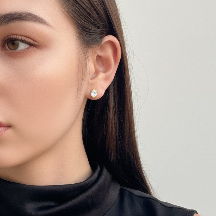 gold oval stud earrings with cubic zirconia