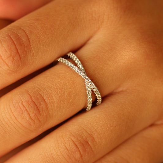 Criss cross statement ring on hand