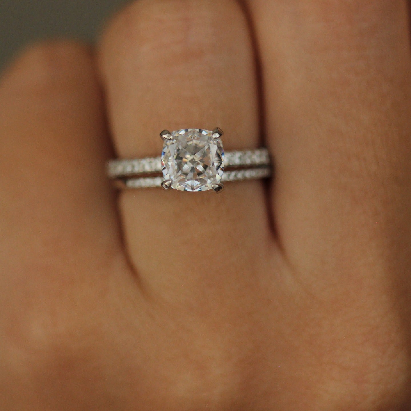 Florence Cushion Ring on hand with 1mm pave band