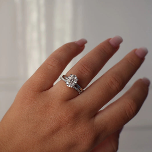 2ct oval moissanite ring on hand
