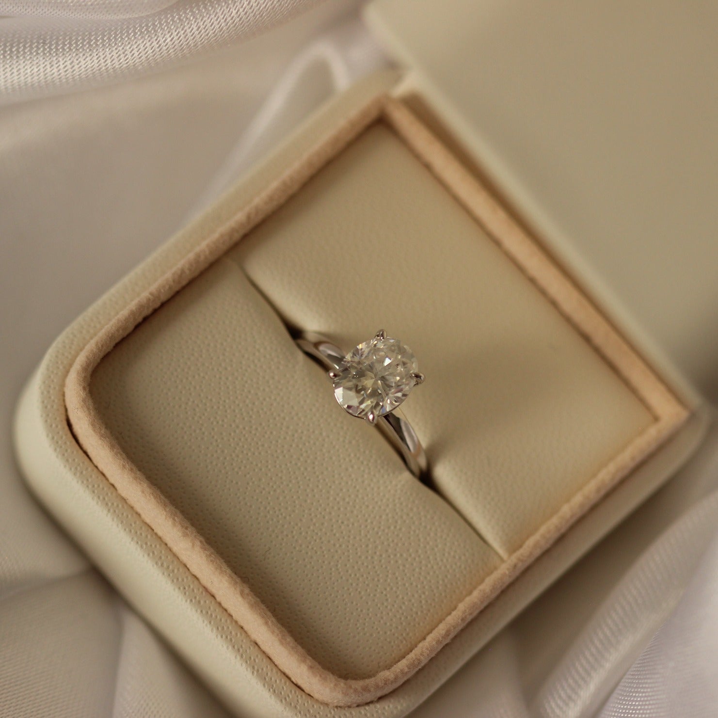 2 carat oval moissanite ring in proposal ring box 