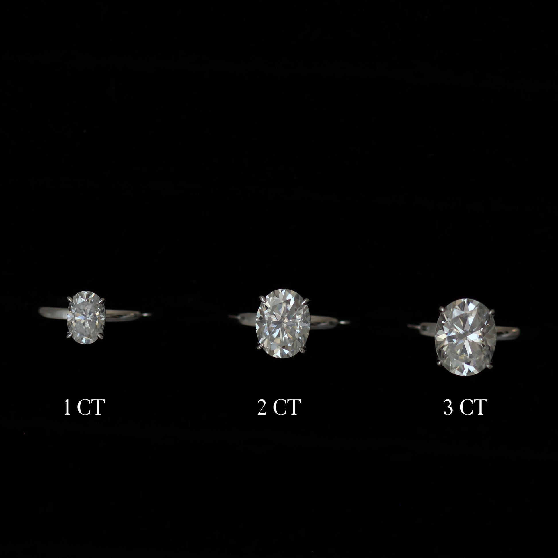 Three oval moissanite rings in different carat sizes comparison shot