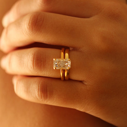 Gold vermeil wedding band and 2ct radiant ring on hand