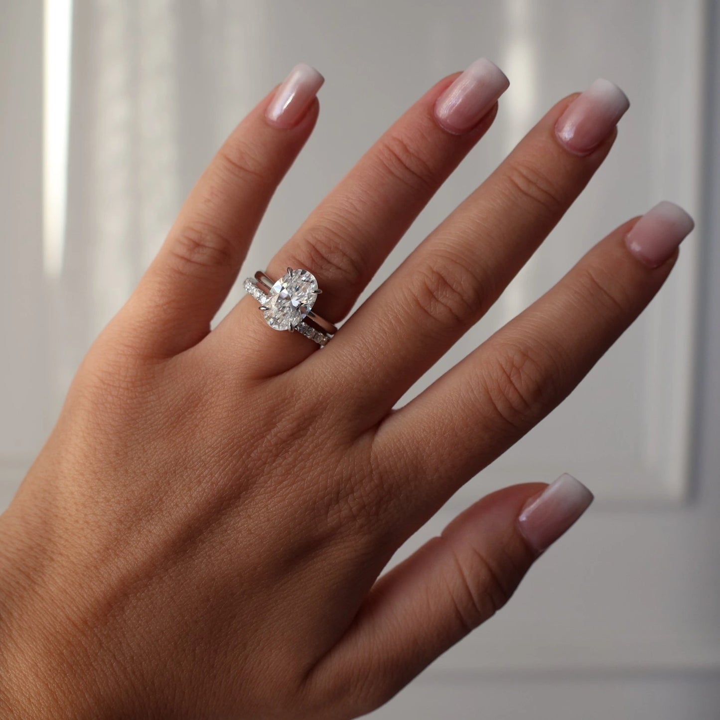 4 ct oval moissanite hidden halo solitaire ring in 925 sterling silver