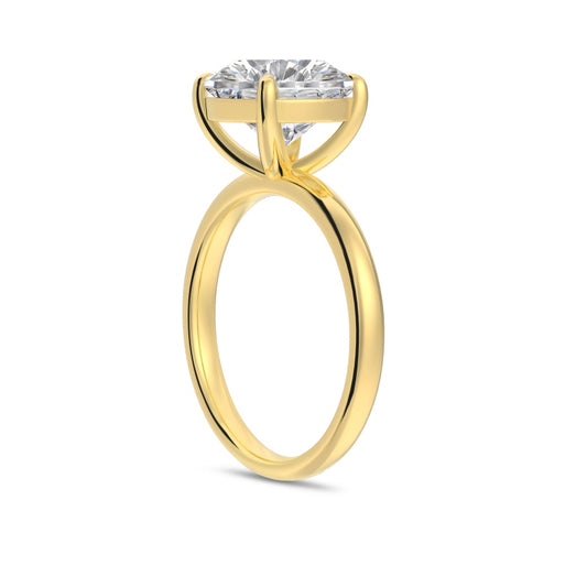 4 carat round cut gold ring on white background