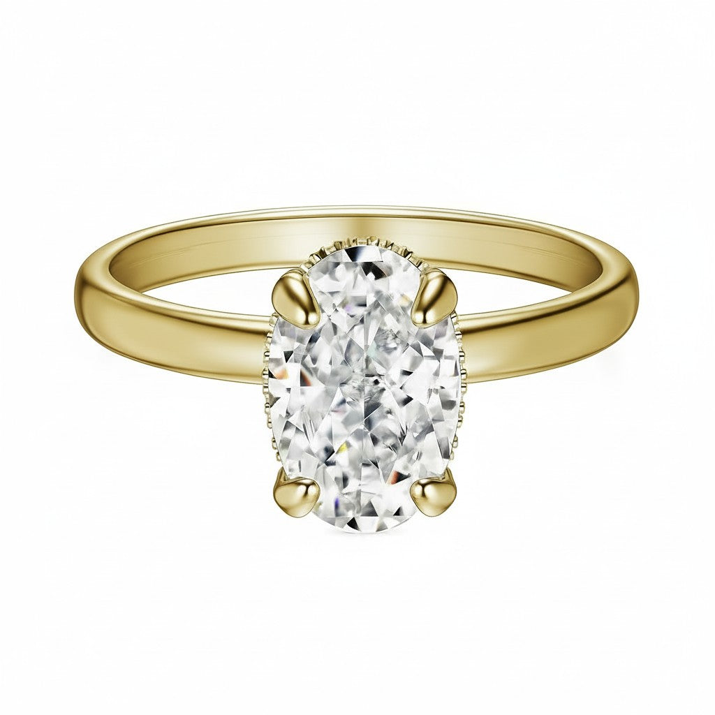 gold Oval ring with side halo on white background