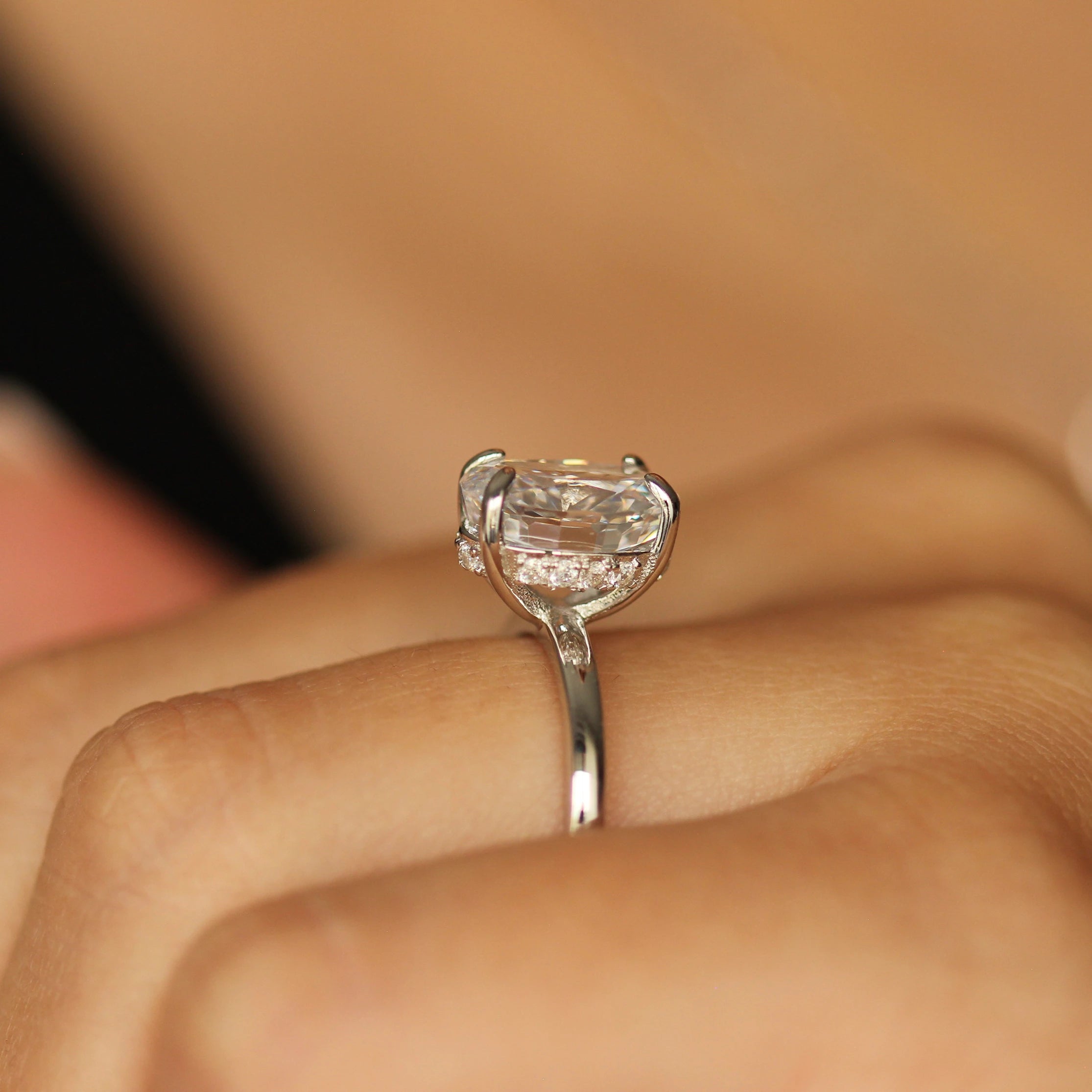 silver oval ring side profile side halo