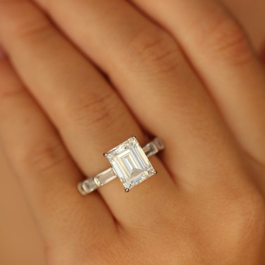 Emerald cut cubic zirconia ring on hand