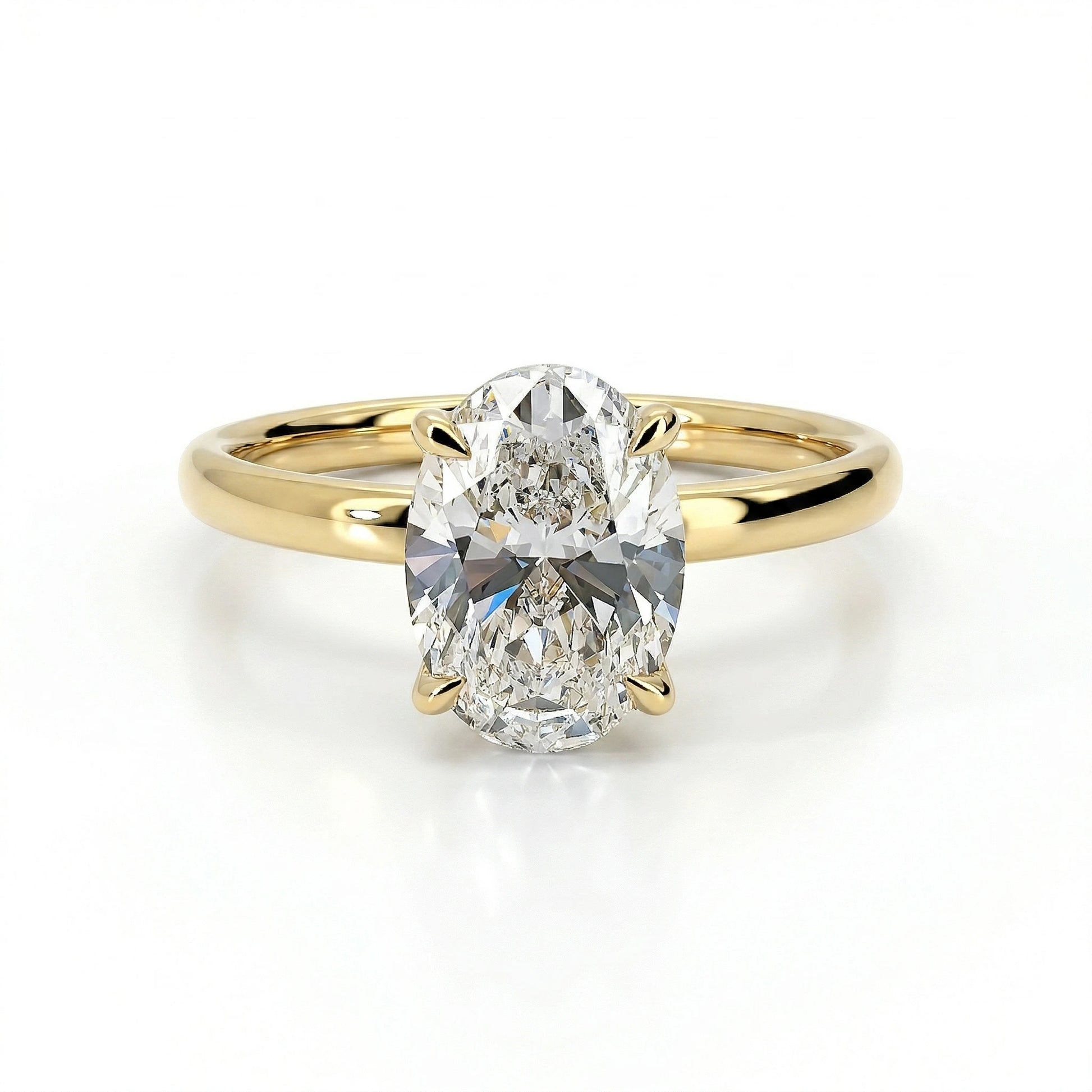 Gold oval lab grown diamond engagement ring on white background