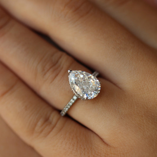 Silver 3 carat pear ring on hand