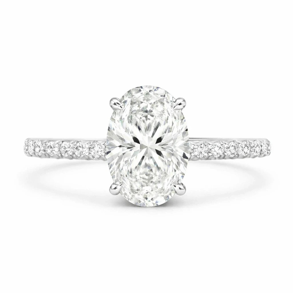 moissanite oval ring with 3 ct gemstone and moissanite pave band against a white background