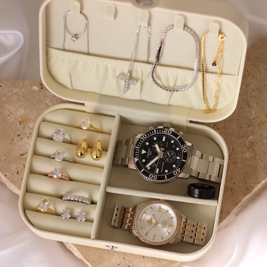 Travel jewellery case with travel ring co jewellery inside, Tissot watch and Vivienne Westwood watch
