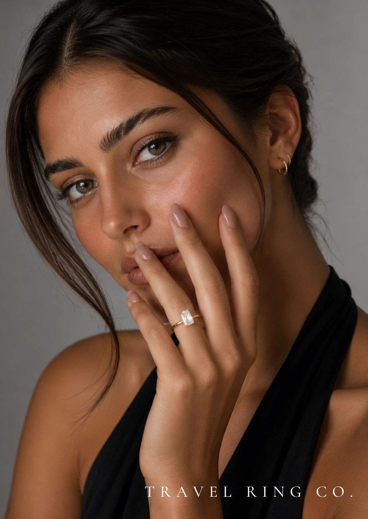 Travel Ring Co Main Banner Model Posing Gold Rectangle Ring