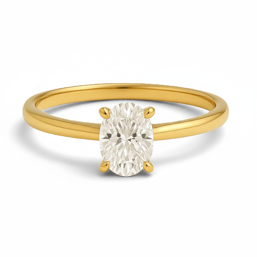 1ct oval gold ring on white background