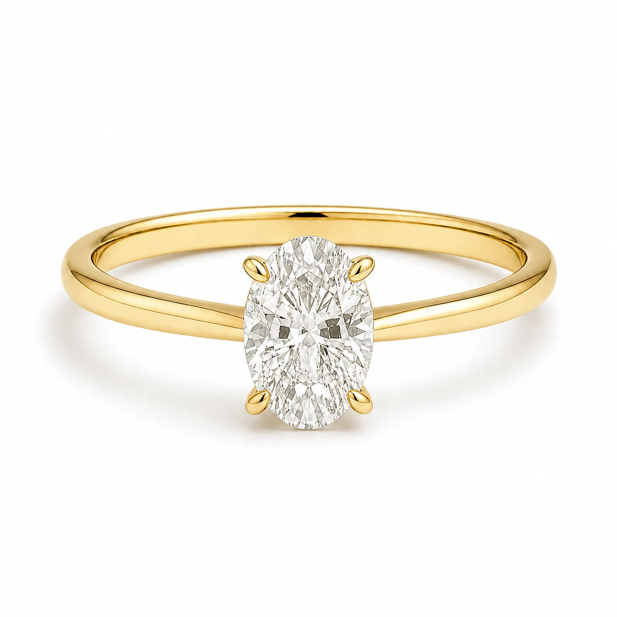 1ct oval gold ring on white background