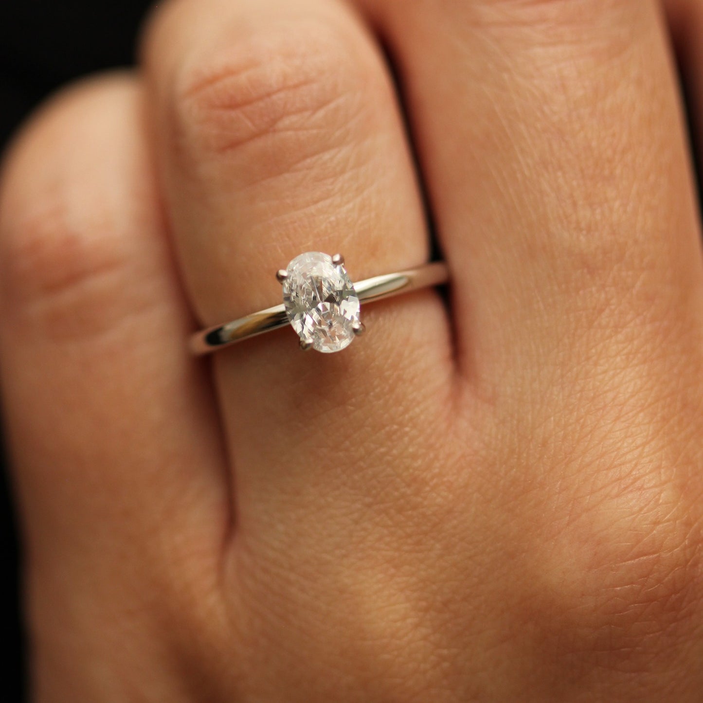 1ct oval ring on white background