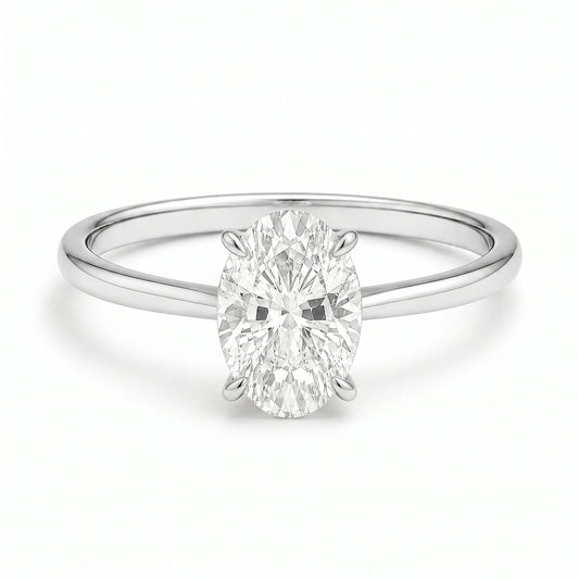 2 carat silver solitaire oval ring on white background