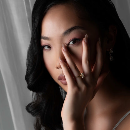 Rectangle gold ring on model