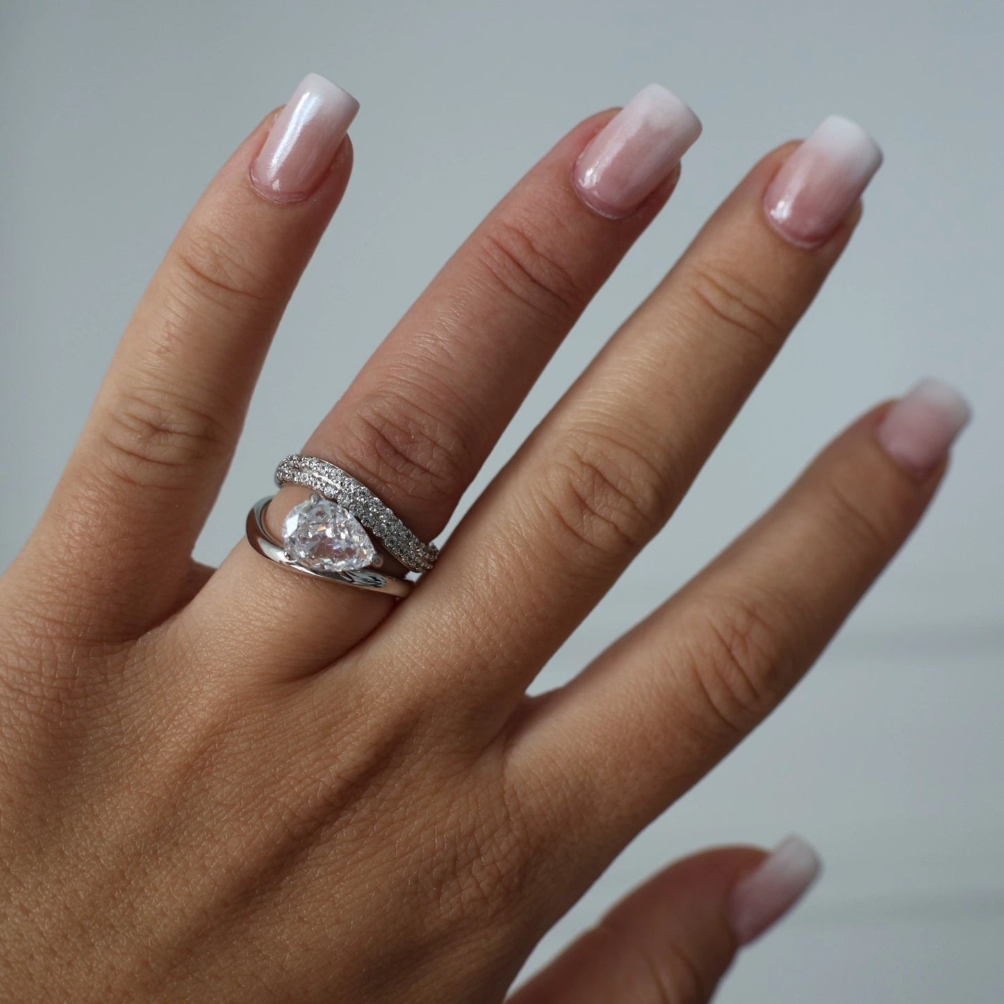 East west oval cubic zirconia ring with a 2.5ct center stone in silver
