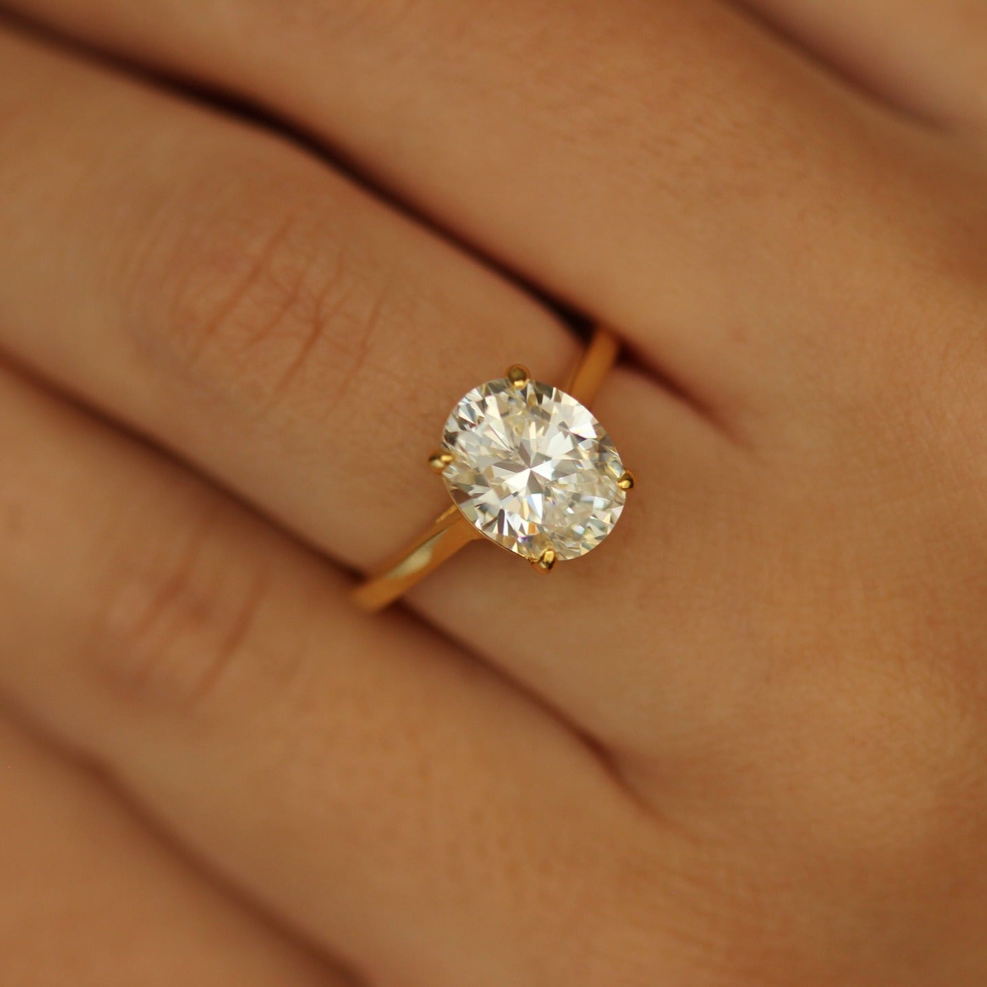 3 carat oval ring with gold band