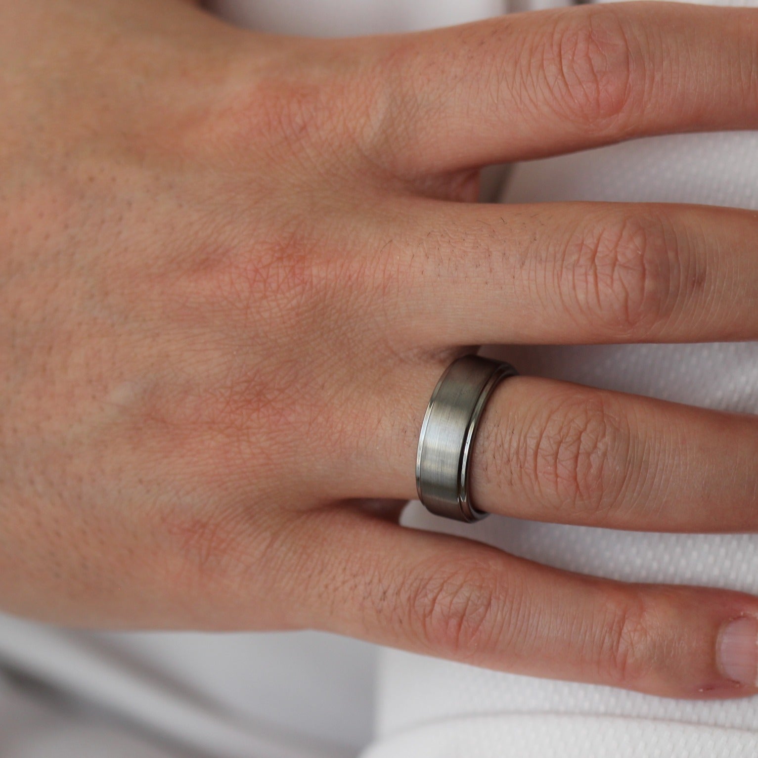 brushed silver men's ring with stepped edges