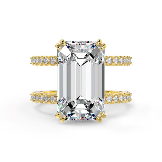 Gold emerald ring with two pave bands