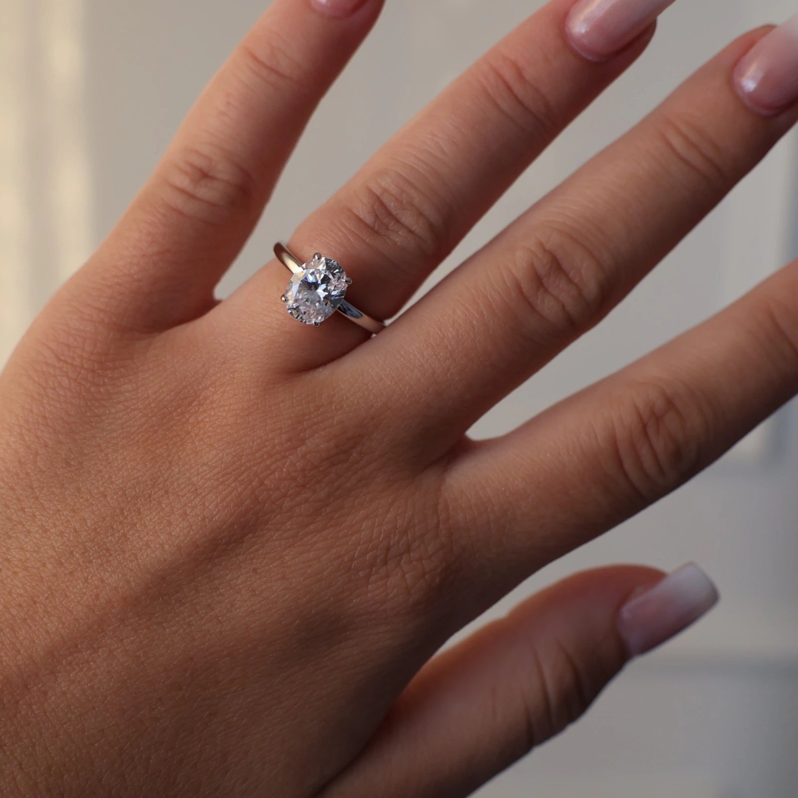 2 carat oval cut silver dupe engagement ring